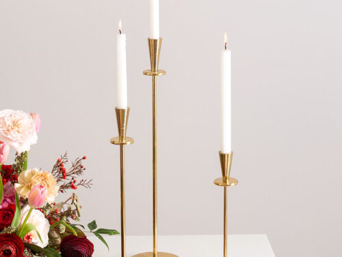 Gold candlesticks for tapers