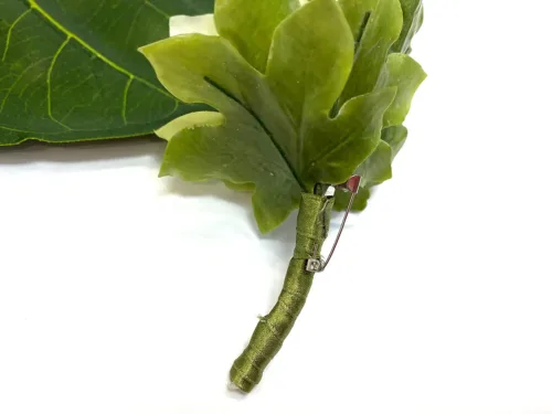 green orchid boutonniere