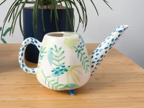 painted ceramic watering can